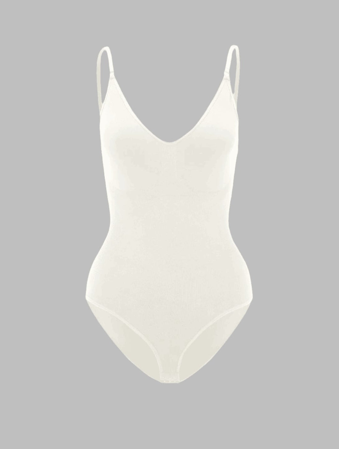 Model in the PowerSculpt shapewear bodysuit in purple showing waist-cinching and curve-enhancing fit