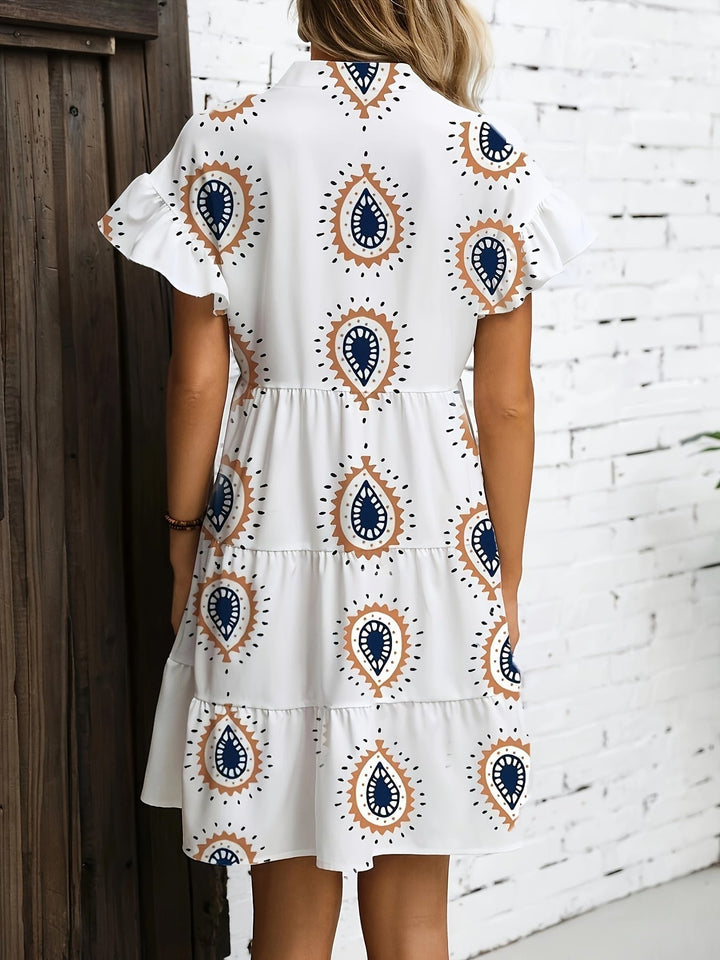 Side view of the Presley white draped midi dress highlighting the flattering, graceful drape