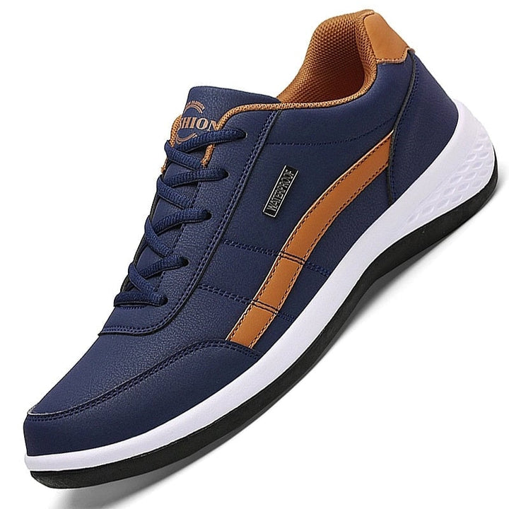 PrimeWalk orthopedic shoes in all three colors — blue, red, and white — flat lay comparison