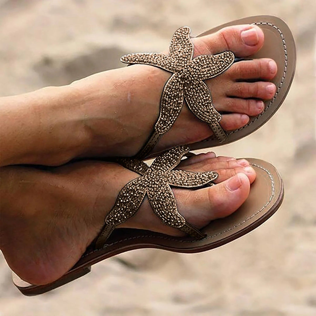 Primrose women's slides in white worn on feet, lifestyle shot