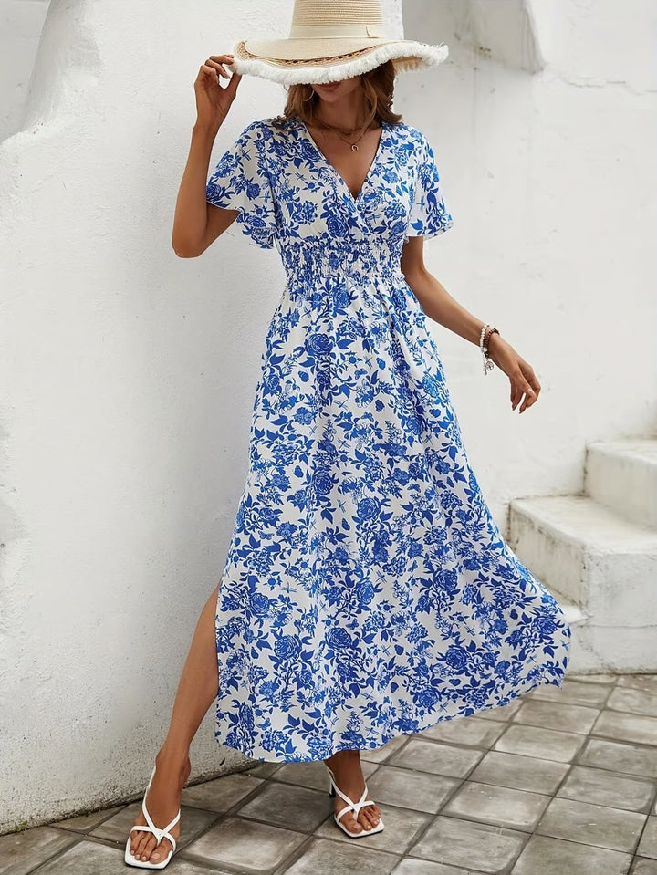Full-length back view of the Primrose blue V-neck boho beach dress
