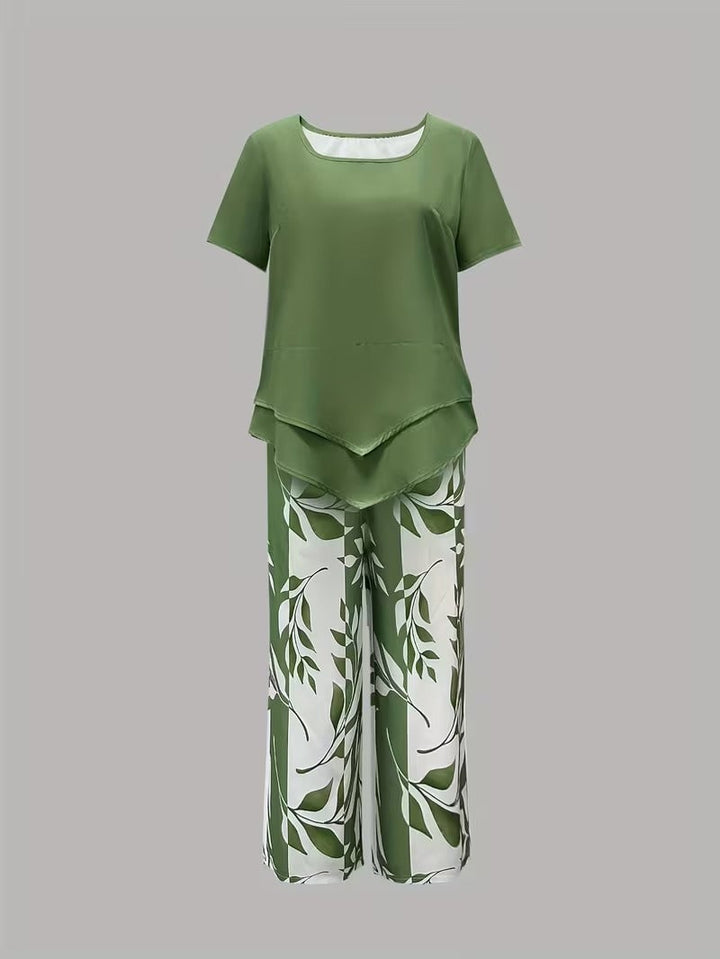 Close-up of leaf print pants fabric detail in green two piece coordinated set