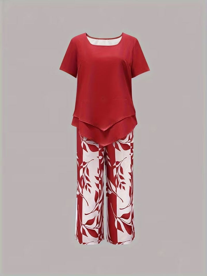 Detail shot of solid short-sleeve top from the women's leaf print two piece set in red