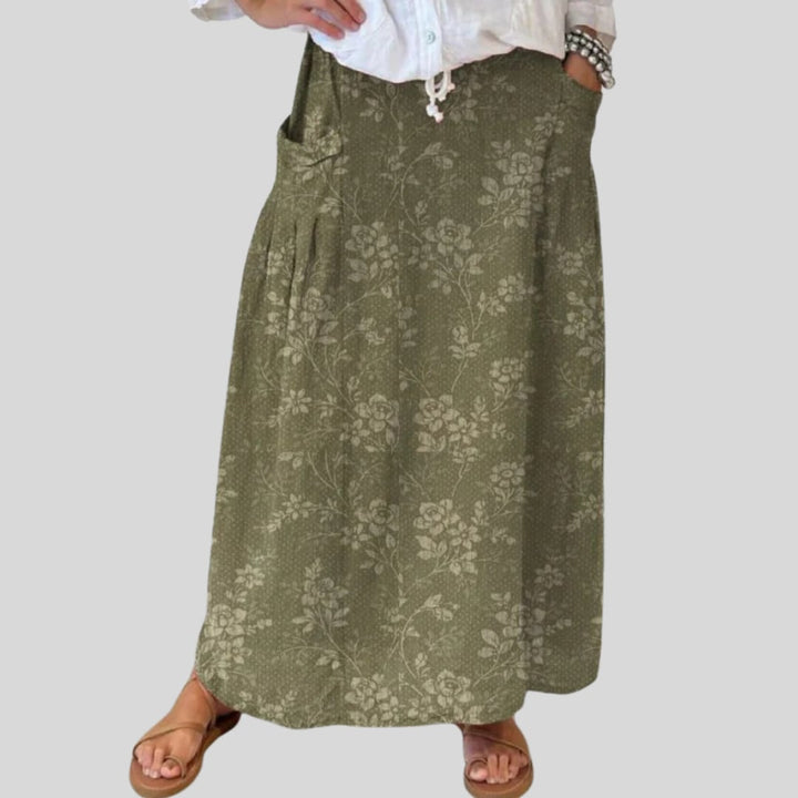 Flat lay of the vintage floral skirt displaying the elastic waistband and all-over floral pattern