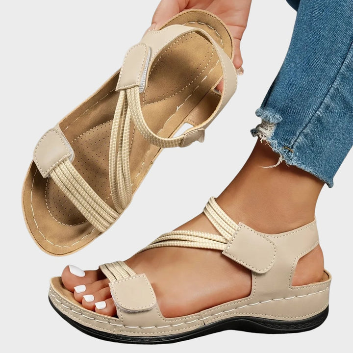 Priscilla casual comfort sandals in blue with dual elastic straps and hook-and-loop closure, front view