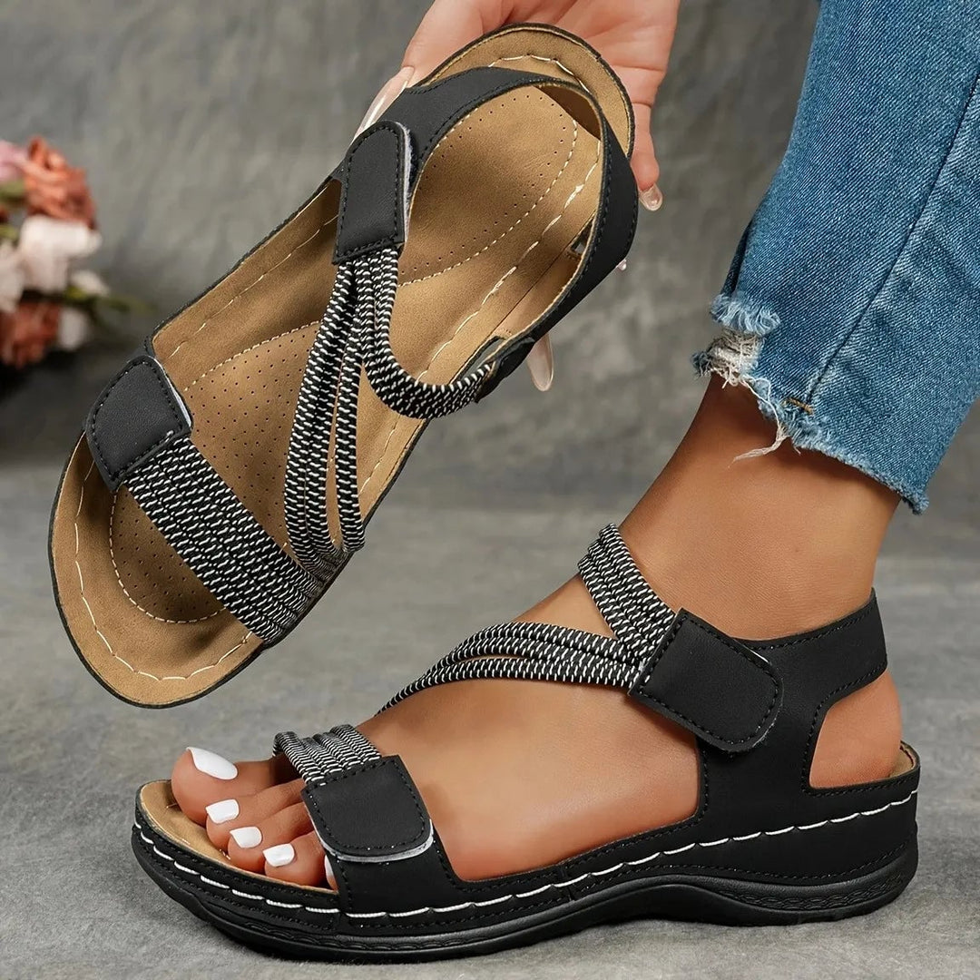 Priscilla casual comfort sandals in black displayed flat lay showing lightweight sole and strap detail