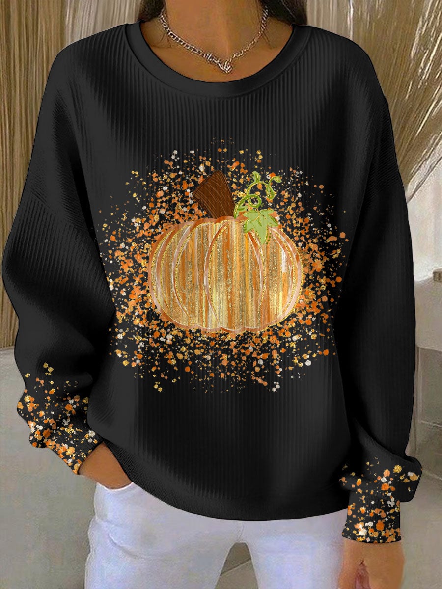 Relaxed-fit pumpkin art sweatshirt in orange with a whimsical fall graphic on the front, shown on a model