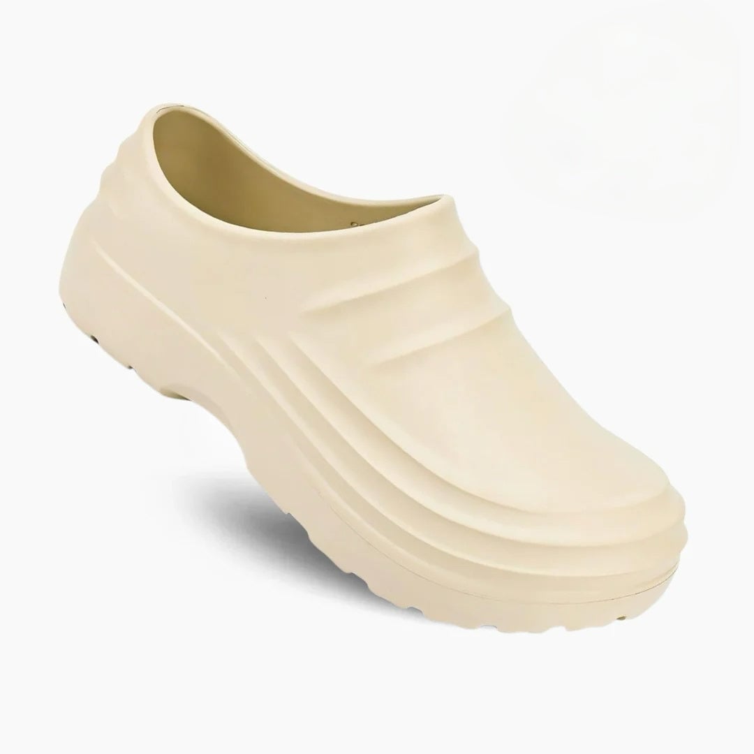 Quinn women's sandals in cream on a neutral background, top-down view