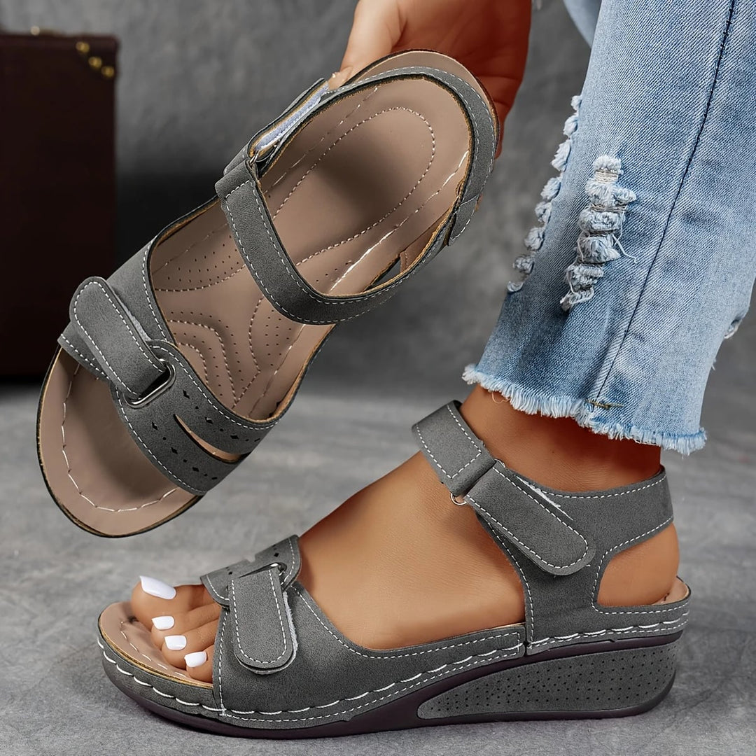 Rae women's platform cushioned wedge sandal in black, top-down view showing cushioned footbed