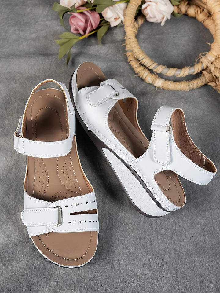 Rae women's platform cushioned wedge sandal in tan, front three-quarter view