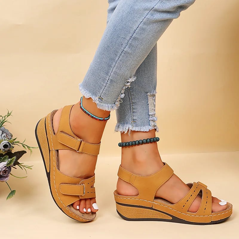 Rae platform cushioned wedge sandals in all four colors — black, red, beige, and tan — displayed together