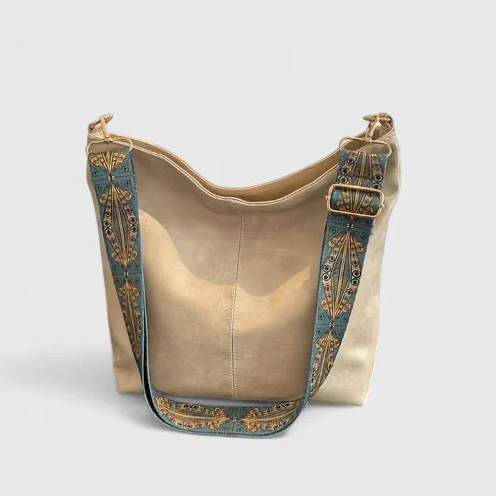 Ragnelle shoulder bag with unique patterned strap in brown, shown from the front