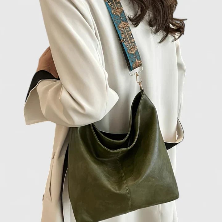 Ragnelle shoulder bag in beige displayed against a neutral background