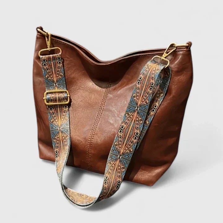 Ragnelle shoulder bag in black showing spacious main compartment