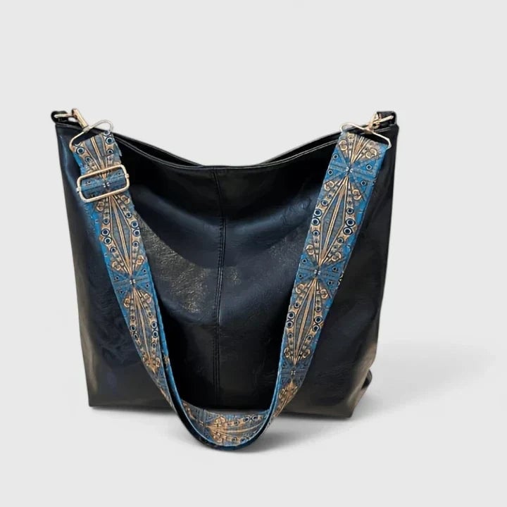 Ragnelle shoulder bag in green styled with a casual everyday outfit