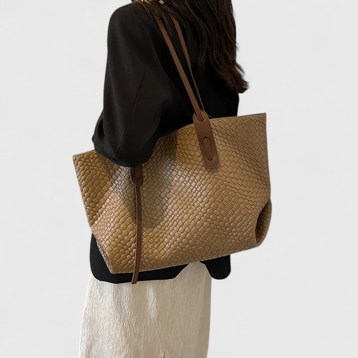 Interior view of the spacious classic woven tote bag in beige