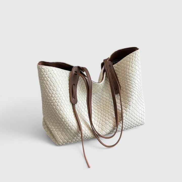 All four color options of the classic woven tote bag lined up