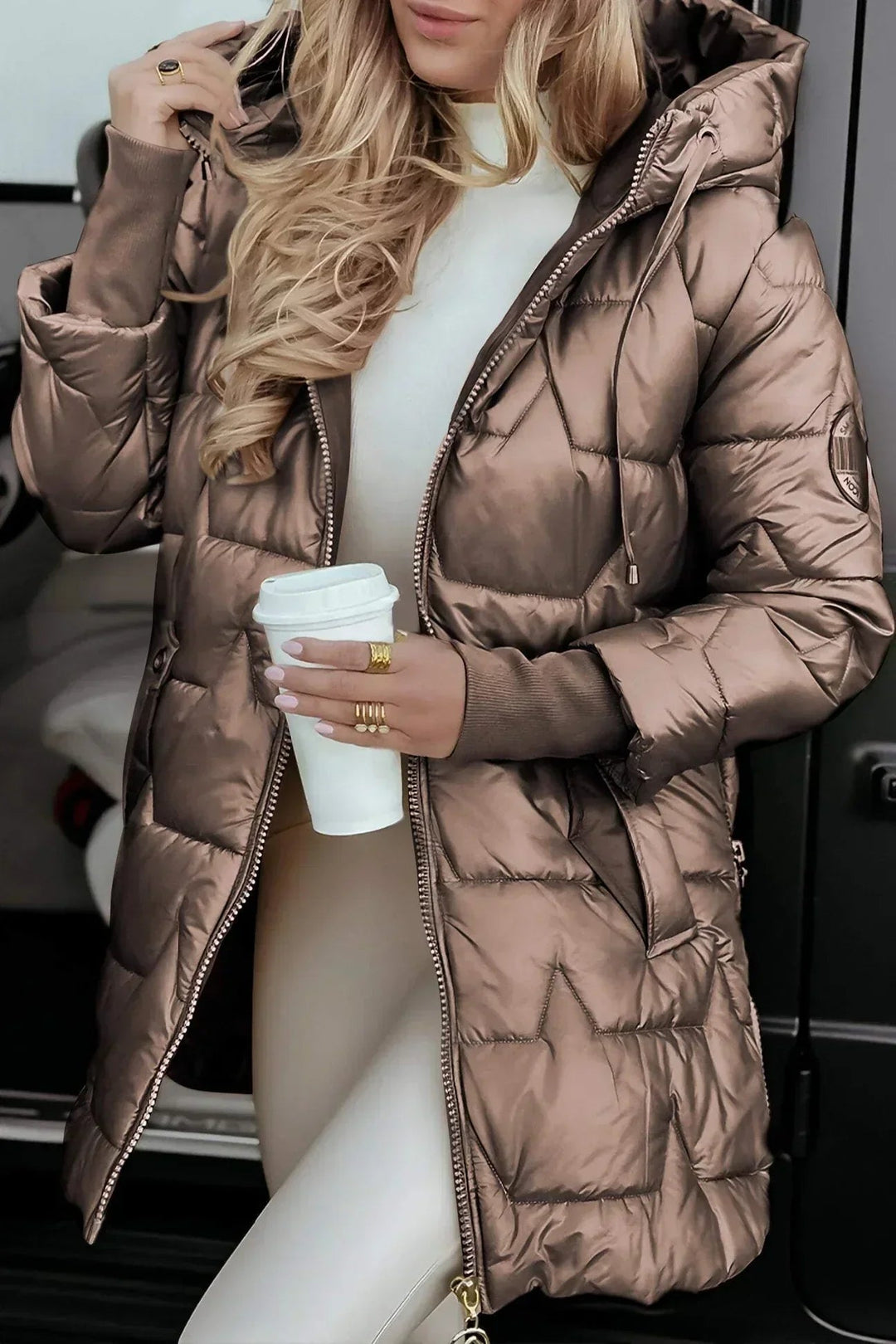 Front view of the Raven winter coat in brown showing refined tailored lines and cozy insulation