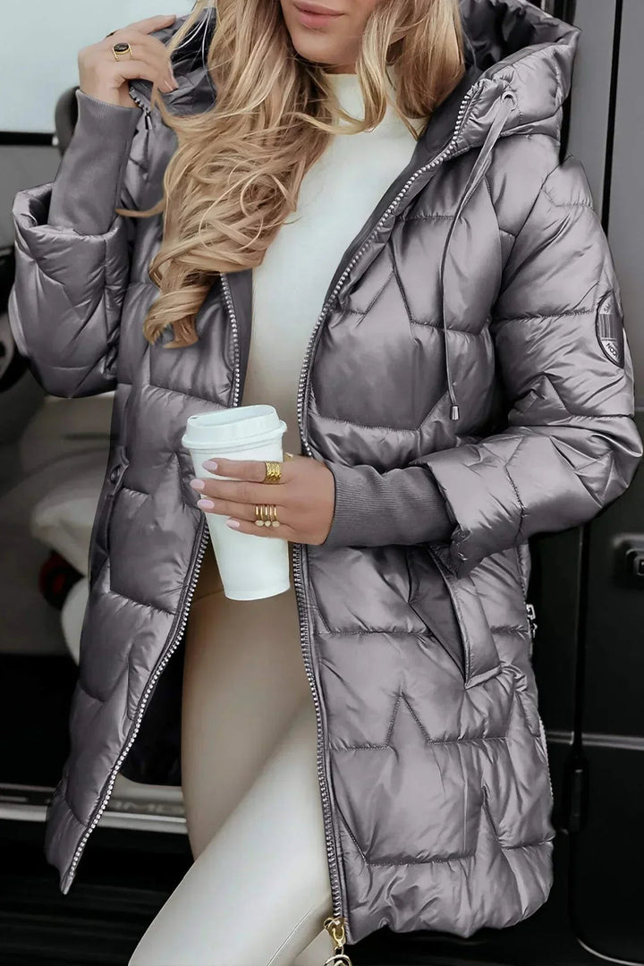 Close-up detail of the Raven winter coat in gray highlighting the clean contemporary design