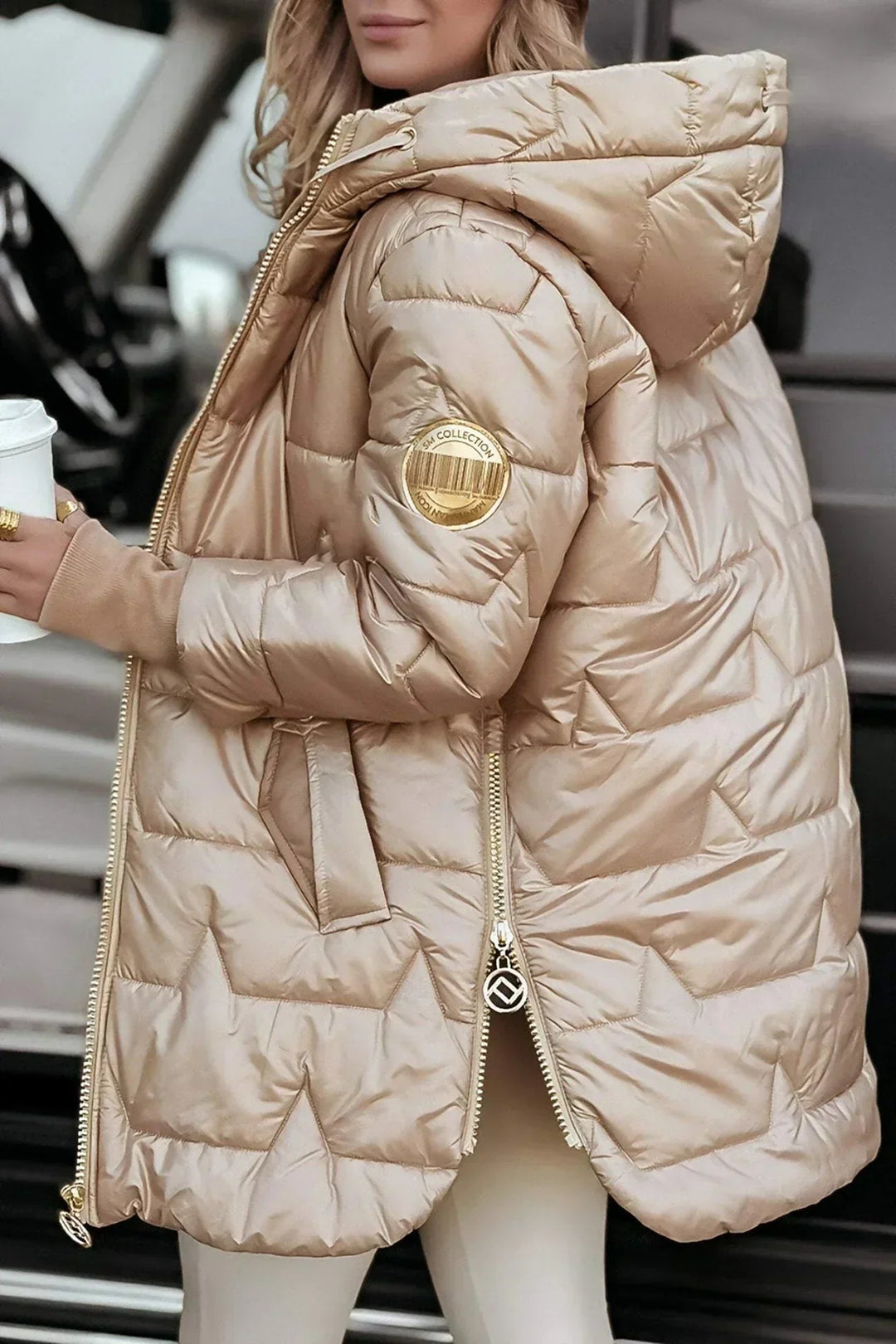 Side profile of woman in the Raven beige winter coat showing flattering fit and coat length