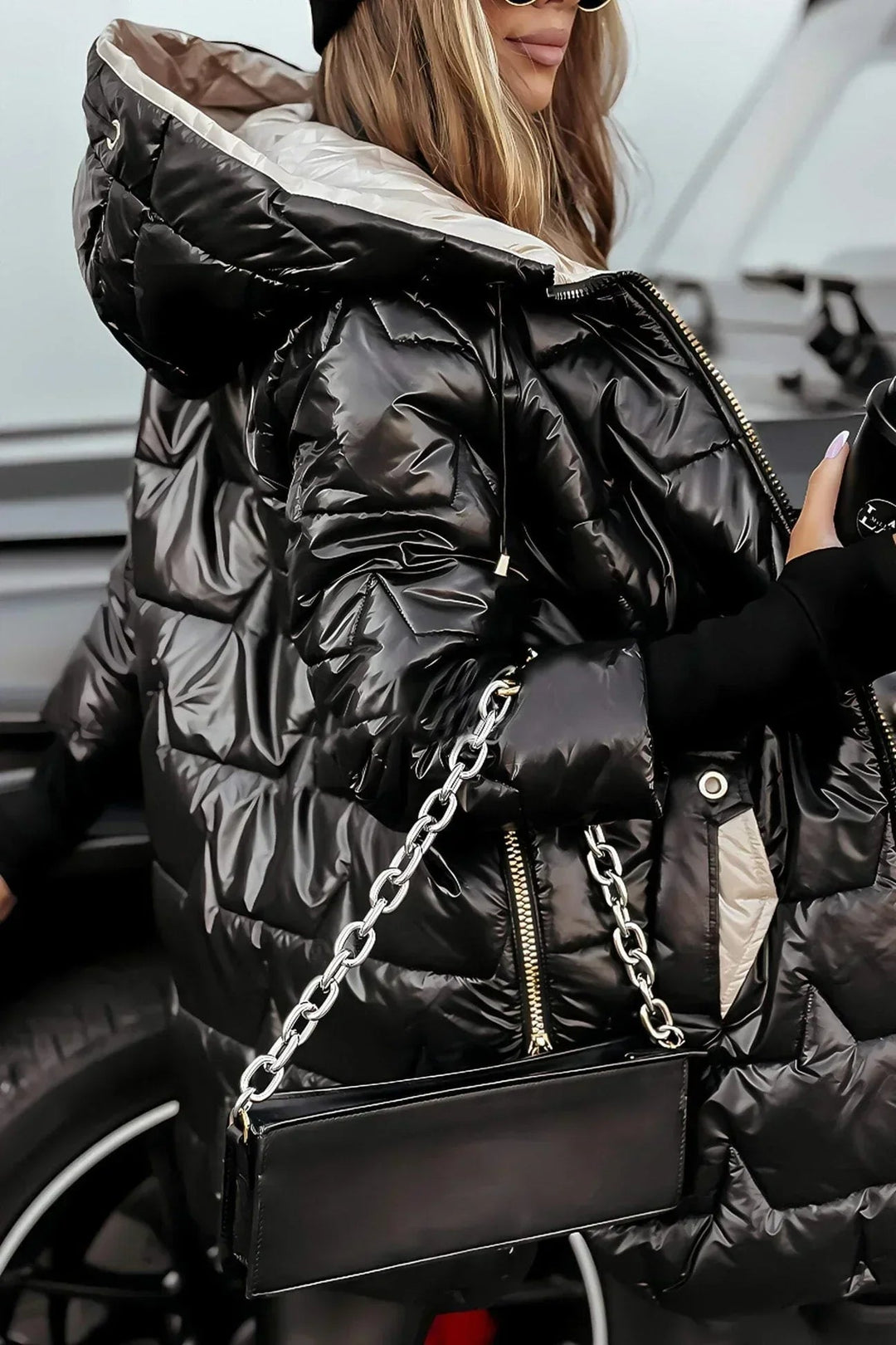Lifestyle image of the Raven winter coat in beige worn during a casual city outing