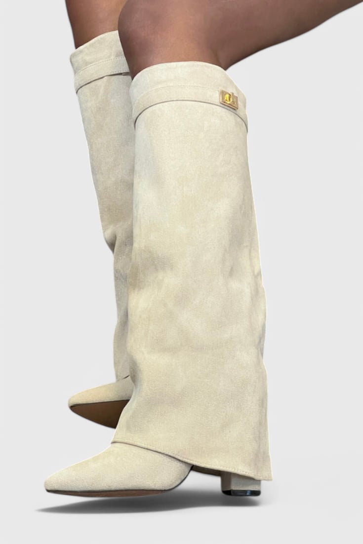 Woman wearing Raya sleek everyday boots in beige with a streamlined silhouette, front view