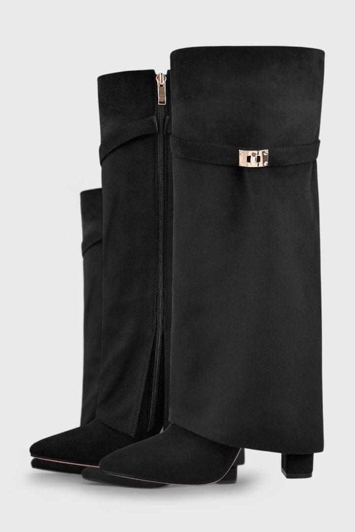 Raya everyday boots in black suede shown on a neutral background, three-quarter angle