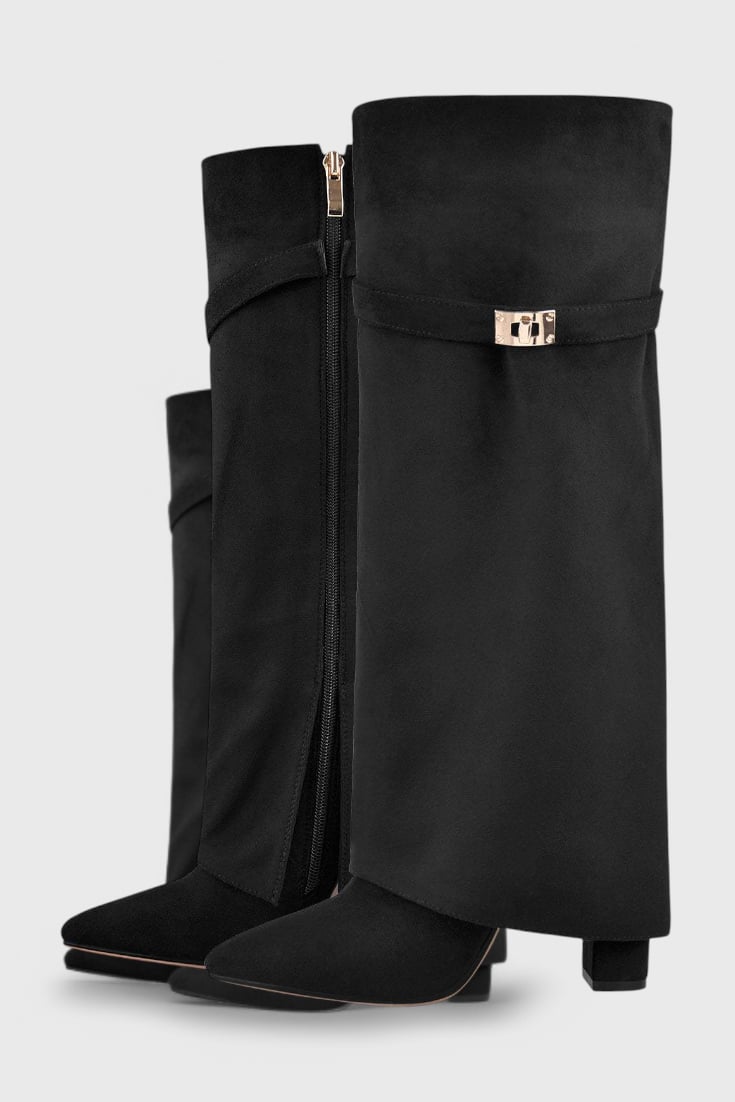 Raya everyday boots in black suede shown on a neutral background, three-quarter angle
