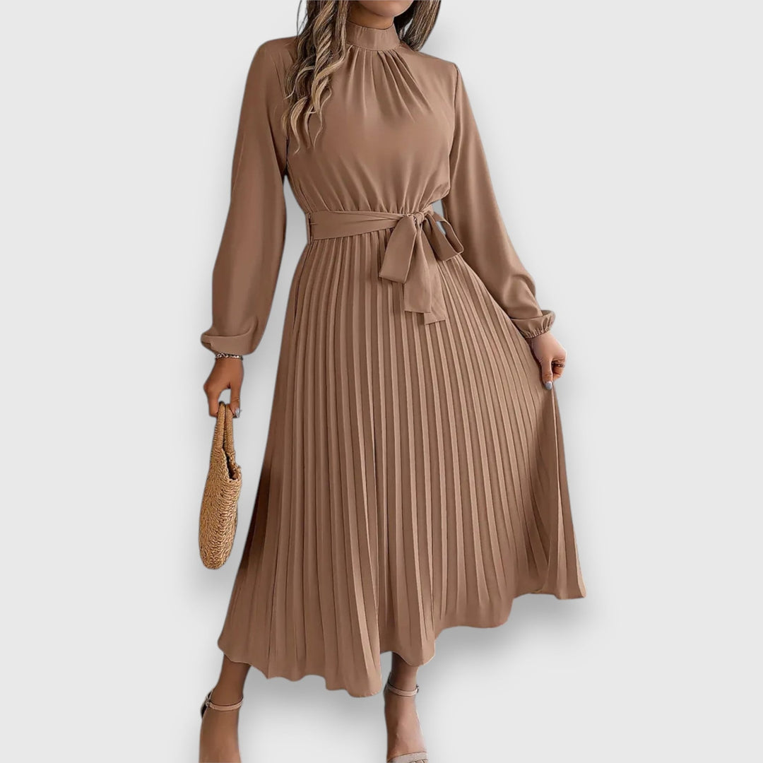 Elegant pleated midi dress in black with fluid drape and midi-length hemline
