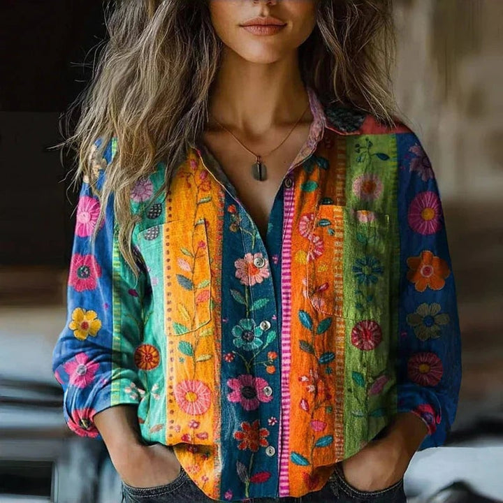 Flat lay of bohemian pattern vintage blouse highlighting print detail and fabric drape