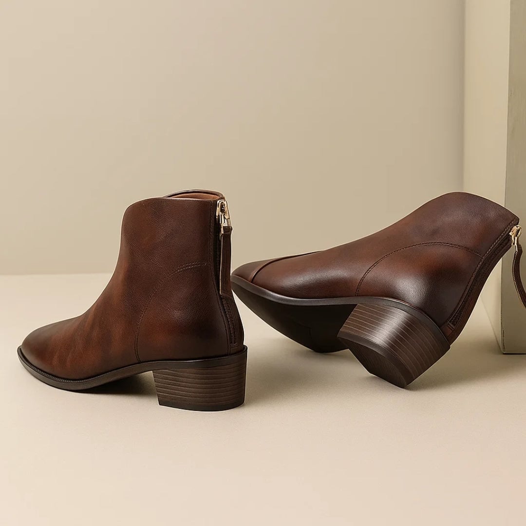 Close-up of the premium soft leather upper on Rebecca ankle boots in black