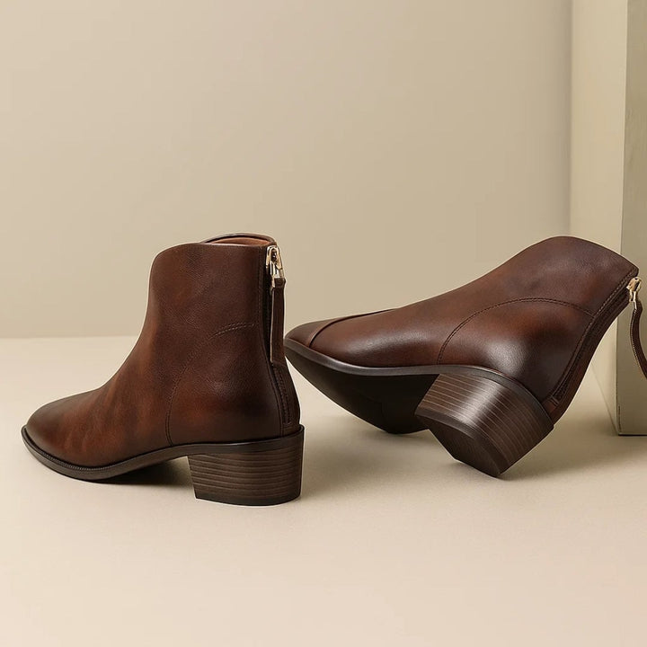 Close-up of the premium soft leather upper on Rebecca ankle boots in black