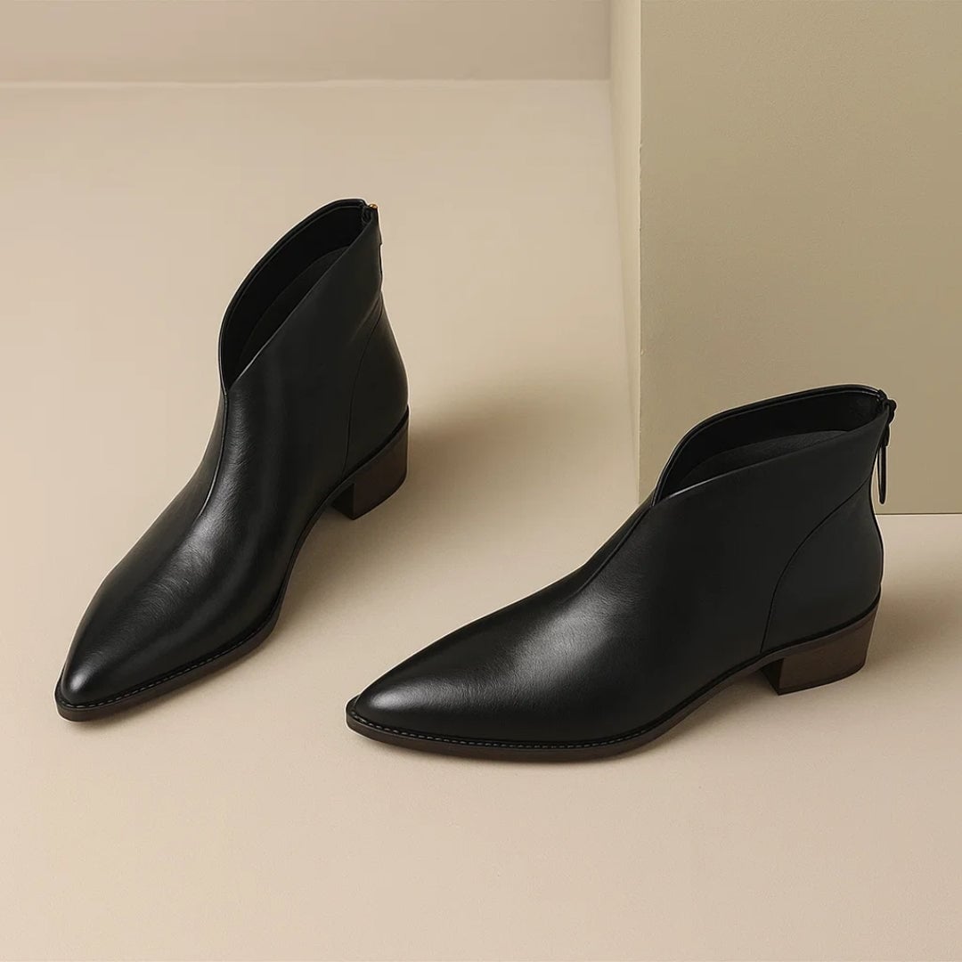 Back view of Rebecca ankle boots in brown highlighting sleek heel structure