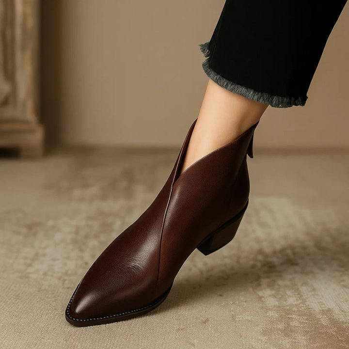 Top-down view of Rebecca ankle boots showing cushioned insole detail