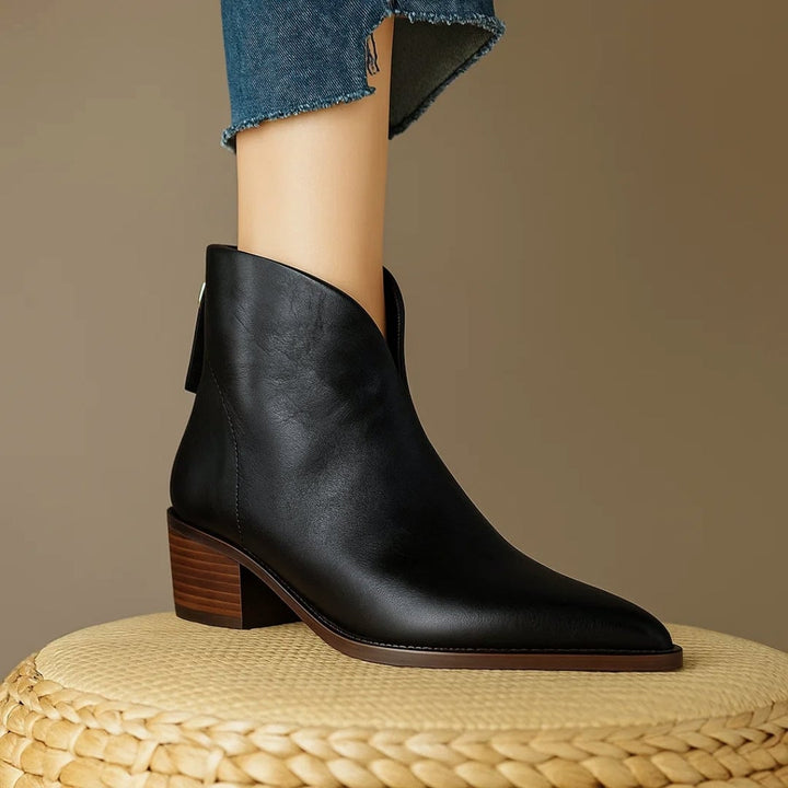 Close-up of the sole and heel of Rebecca ankle boots in black