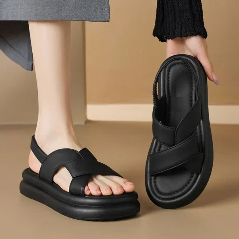 Front view of Reese women's wedge sandals in brown on a neutral background