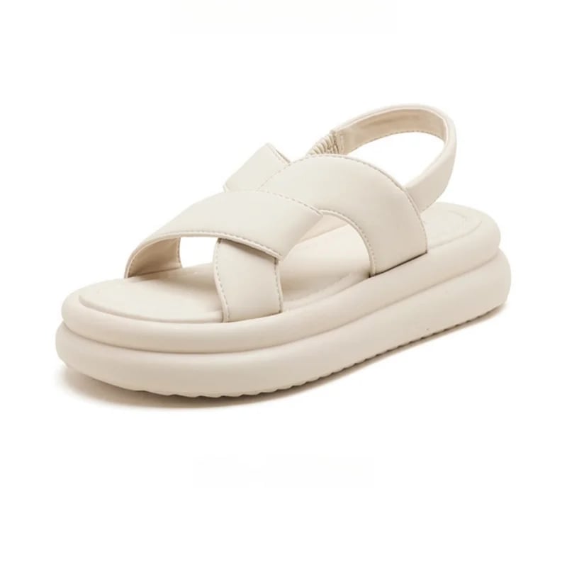Pair of Reese orthopedic sandals in beige displayed flat on a clean white surface