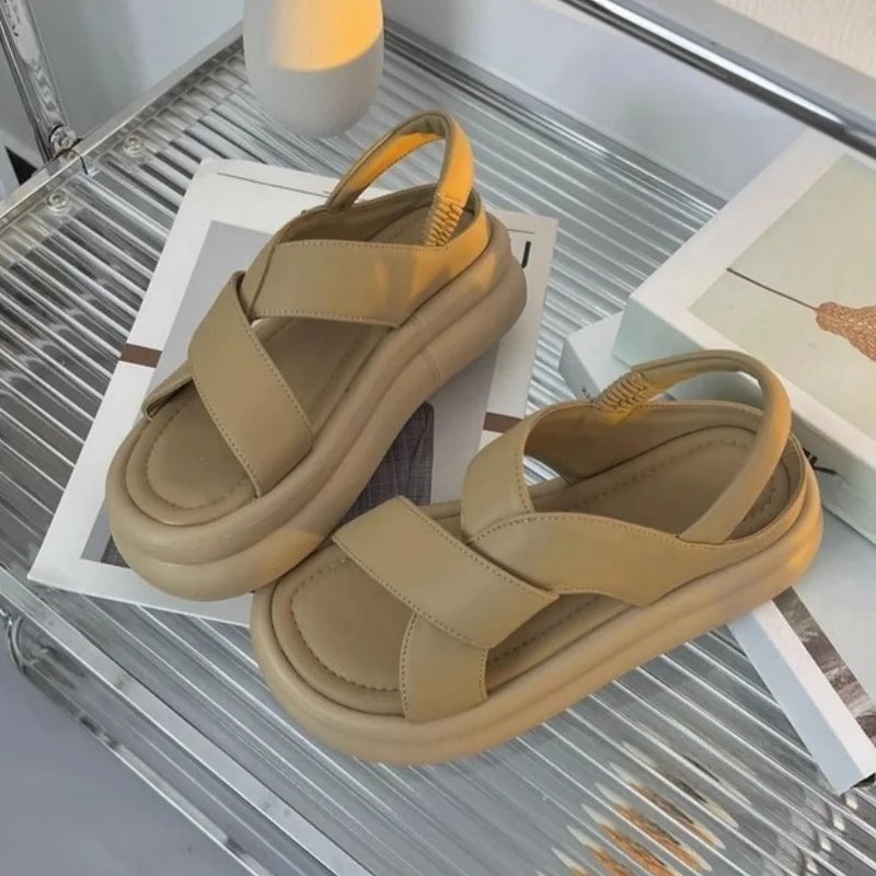 Reese wedge sandals in brown showing non-slip outsole detail from underneath