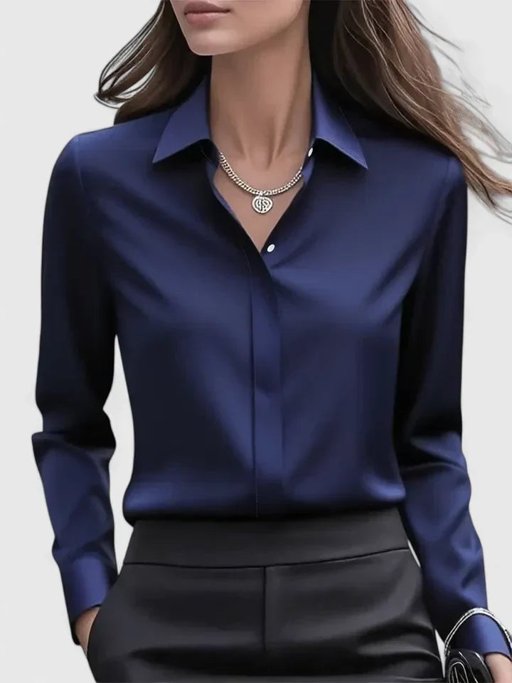 Front view of the Reese satin button-down shirt in navy blue with concealed placket and pointed collar