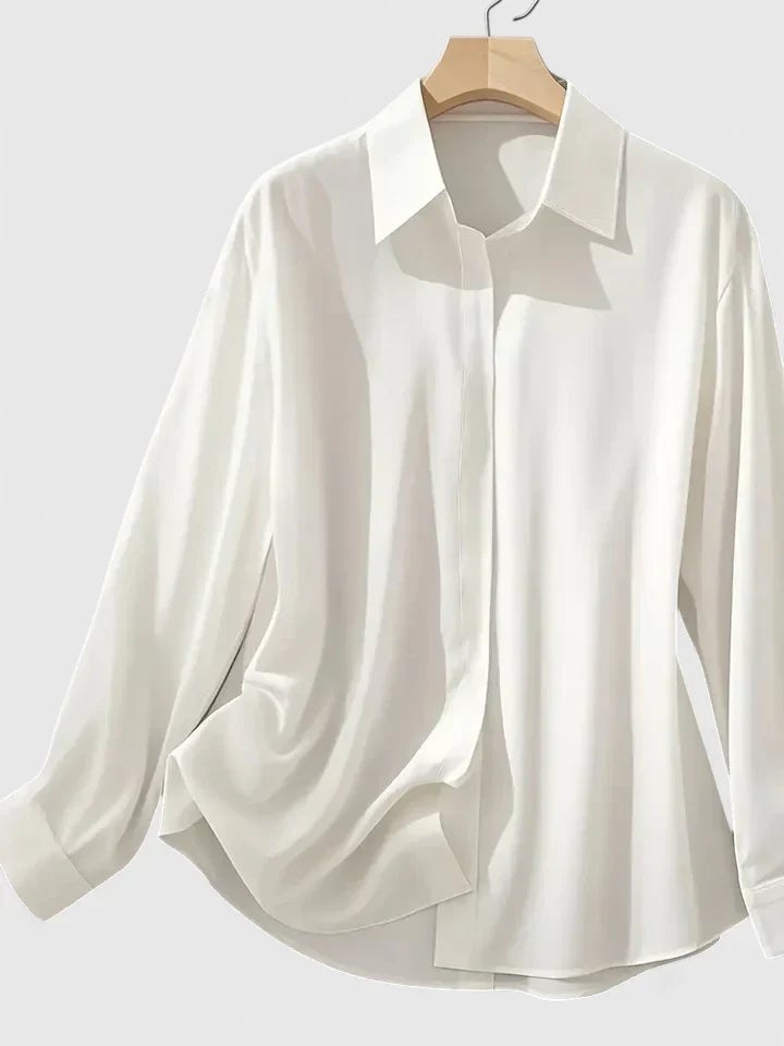 Reese satin shirt in white styled with tailored trousers for a polished office look