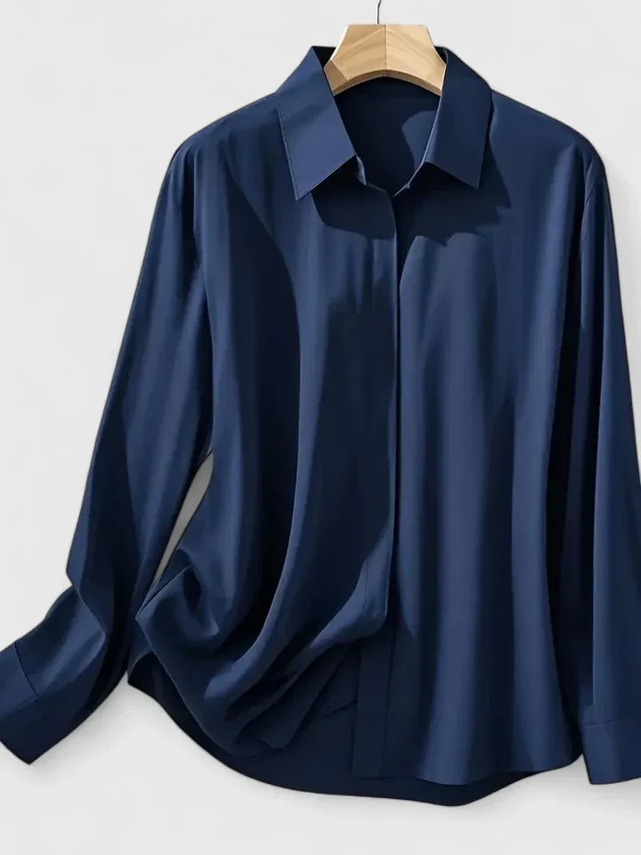 Back view of the Reese satin shirt in black showing clean silhouette and fitted sleeves