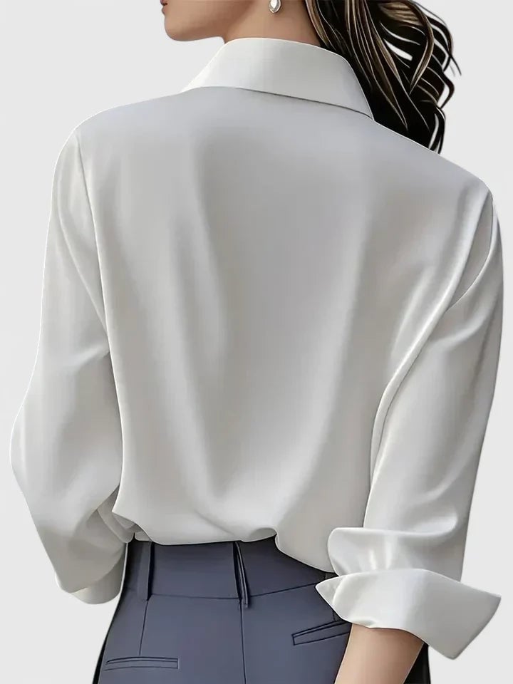 Close-up of the satin fabric finish and concealed placket on the Reese shirt in gray
