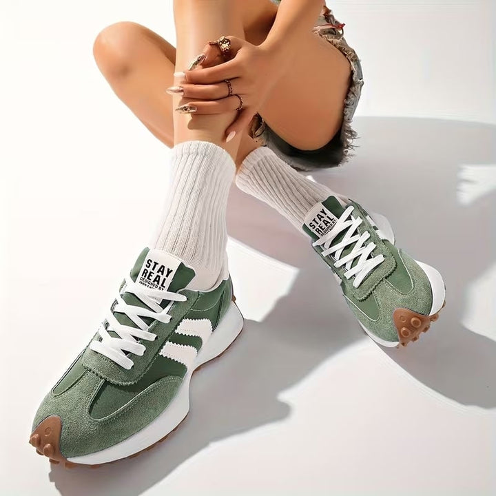 Reeve retro platform sneakers in red with bold white stripe paneling, side view