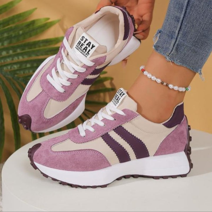 Reeve retro platform sneakers in yellow with contrast white stripes, side profile view