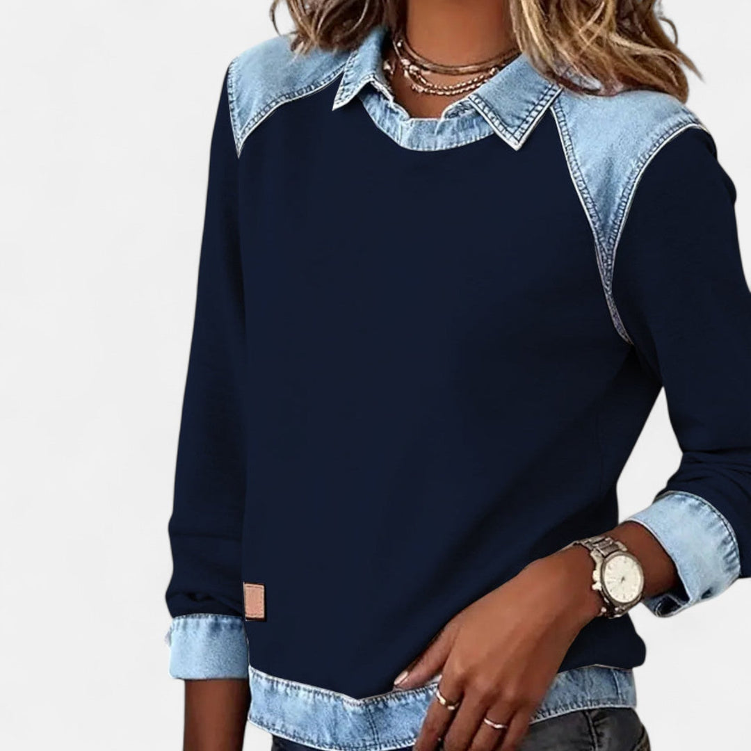 Front view of the Regina long sleeve sweater in navy blue showing clean lines and flattering silhouette