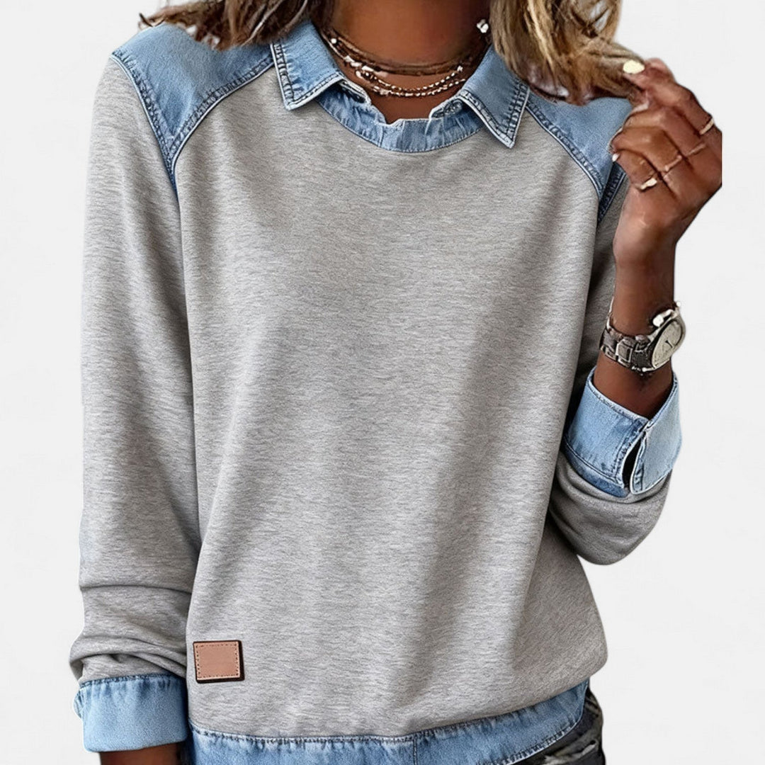 Close-up detail of the Regina long sleeve sweater fabric in gray highlighting its lightweight breathable texture