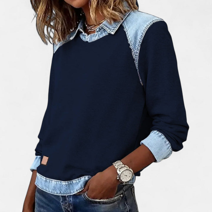Regina long sleeve sweater in pink displayed on a model highlighting the relaxed comfortable silhouette