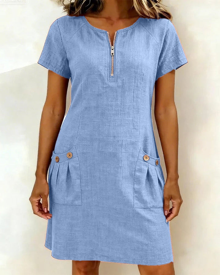 Remi green shift dress showing A-line silhouette and above-the-knee length