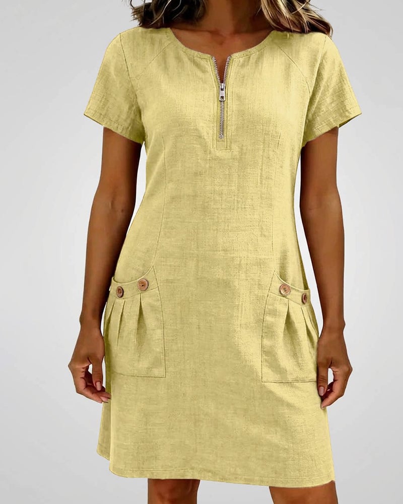 Side view of the Remi blue shift dress highlighting the flared skirt and short sleeves