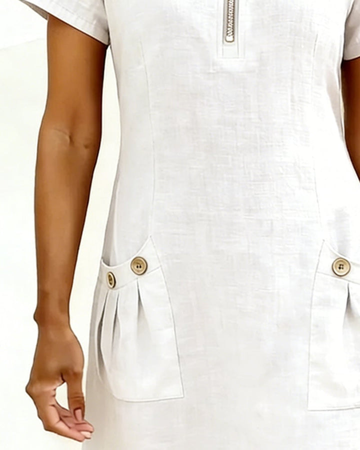 Remi pink shift dress side view showing A-line flare and comfortable silhouette